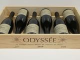 six bottles of red wine in a wooden box