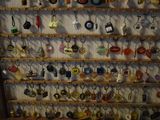 a display case with many different key chains on it
