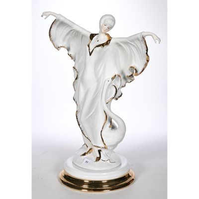 an image of a statue of a woman with her arms outstretched