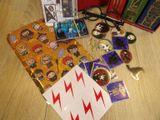 many items that are sitting on a table next to a pair of scissors and a pair of scissors