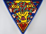 un tableau représentant un triangle sur lequel est dessiné un chat