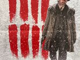 une affiche de film représentant un homme en chapeau et manteau, debout dans la neige