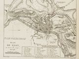 an old map of the city of lyon, france with a hand pointing at it