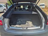 a trunk of a car with a bunch of electronics in it