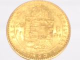 an image of a gold coin with a coat of arms on it