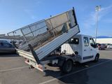 a white truck that has a cage in the back of it