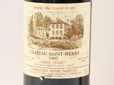 a bottle of wine that is sitting on a table