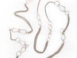 a close up of a metal chain with a silver clasp