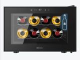 a close up of a wine cooler filled with bottles of wine