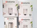 three boxes of brabantia are stacked on top of each other