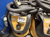 two vacuums that are sitting next to each other on the floor