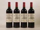 trois bouteilles de vin rouge posées côte à côte sur une table
