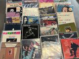 a lot of cds that are sitting on a table
