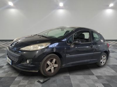 a picture of a black car parked in a garage
