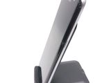 a close up of a cell phone on a stand