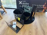 a box with a knife and a cup of coffee next to it