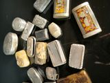 a lot of lighters that are on a table