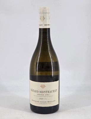 a bottle of wine that is sitting on a table