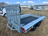 a truck that is parked in the grass