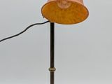 an image of a lamp that is on a stand with a cord