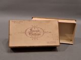 a small box that has a picture of a woman in it