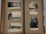a book opened to show pictures of a town