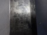 a close up of a knife on a table