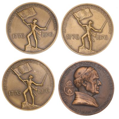 four commemorative coins with a man holding a flag and a flag pole