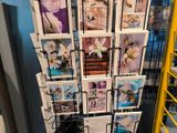 a display of cards on a rack in a store