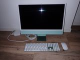 a computer monitor, keyboard, mouse and mouse on the floor