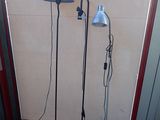 two lamps that are standing next to each other on the floor