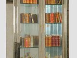 a large display case with many books on it