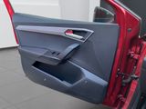 a red car door with the door open and the door handle open