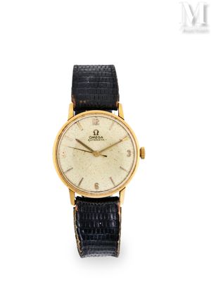 une vieille montre-bracelet plaquée or avec un bracelet en cuir noir