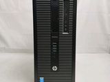 a black desktop computer sitting on top of a white surface