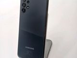 the back of a black samsung galaxy s20 with a camera on top of it