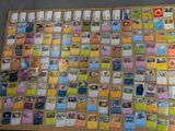 many different types of pokemon cards on the table