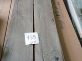 several pieces of wood are stacked on top of each other on a table