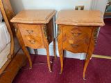 two nightstands that are sitting next to each other