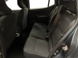 the back seats of a car are empty and the passenger seat is empty
