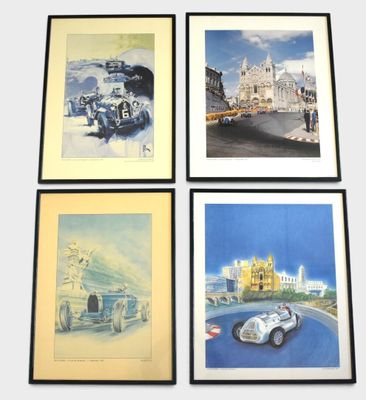 four framed art prints of cars on display in front of a building