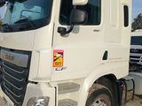a white truck that is parked on the side of the road