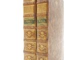 two books that are stacked on top of each other