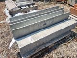 a pile of concrete blocks sitting on the ground