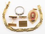 three pairs of gold and silver cufflinks, a ring, and a bracelet