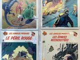 quatre bandes dessinées exposées dans la vitrine d'un magasin