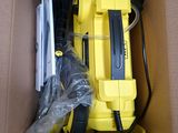 a yellow box with a yellow and black vacuum in it