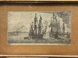 une vieille photo représentant trois navires sur un plan d'eau