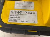 the back end of a yellow and black tool box with a label on it