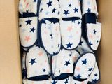 a box full of baby shoes that are in it